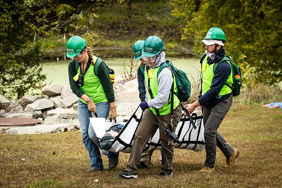 Pictured above, students practice their rescue skills during Northwest's annual Missouri Hope disaster simulation in the fall. This spring, the University's emergency and disaster management program is offering C-CERT training. (Photo by Lauren Adams/Northwest Missouri State University)